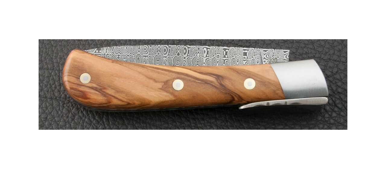Lever lock knife and damascus blade
