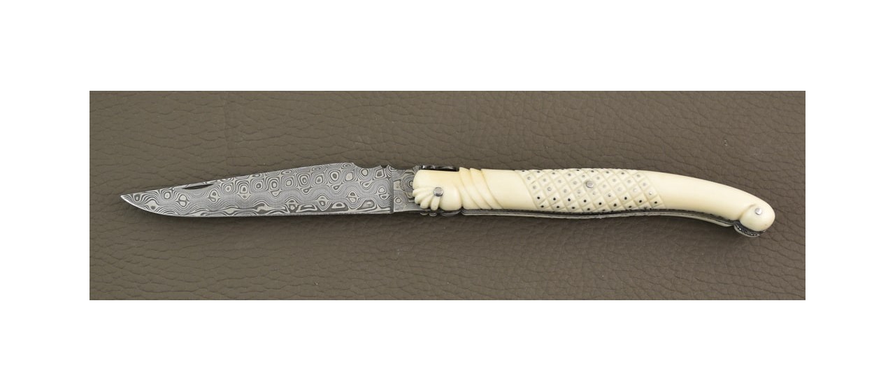 Laguiole delicate filewok damascus blade and genuine bone handle