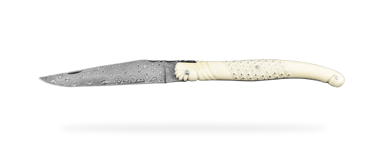 Laguiole delicate filewok damascus blade and genuine bone handle