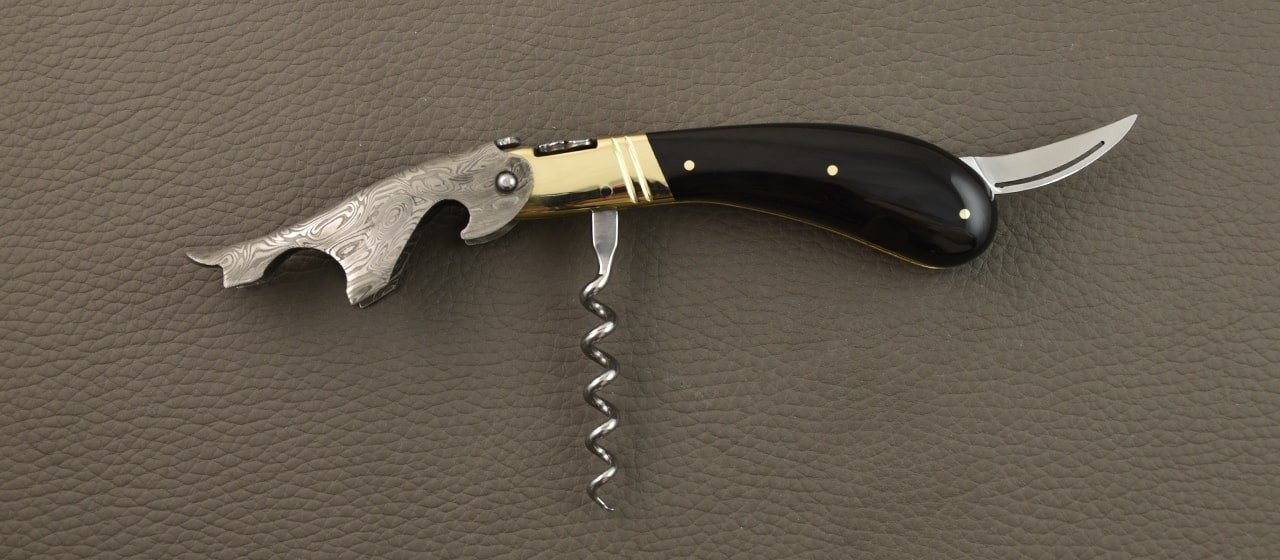 Laguiole Magnum Damascus Black horn tip and brass bolster