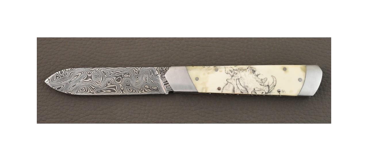 Le Pradel Scrimshaw Phacochère et lame Damas