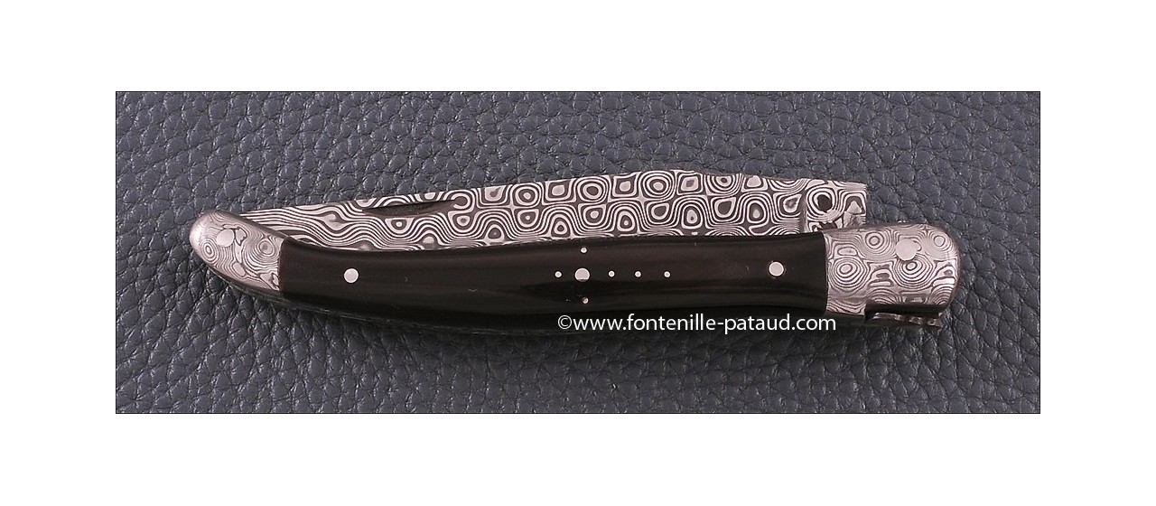 Laguiole delicate filewok damascus blade and bolsters 