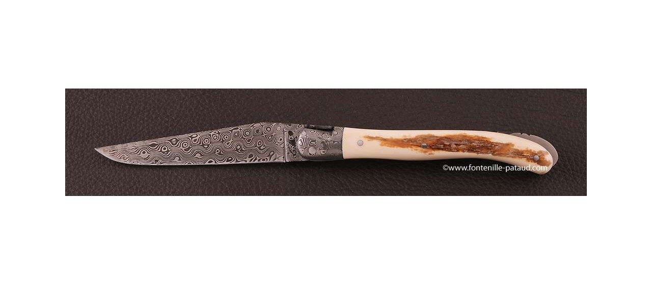 Couteau avec lame en acier damas et ivoire de mammouth fossile