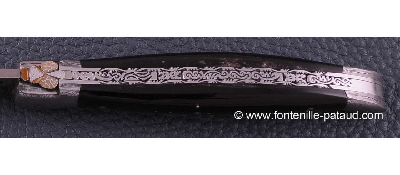 Laguiole delicate filewok damascus blade and bolsters 